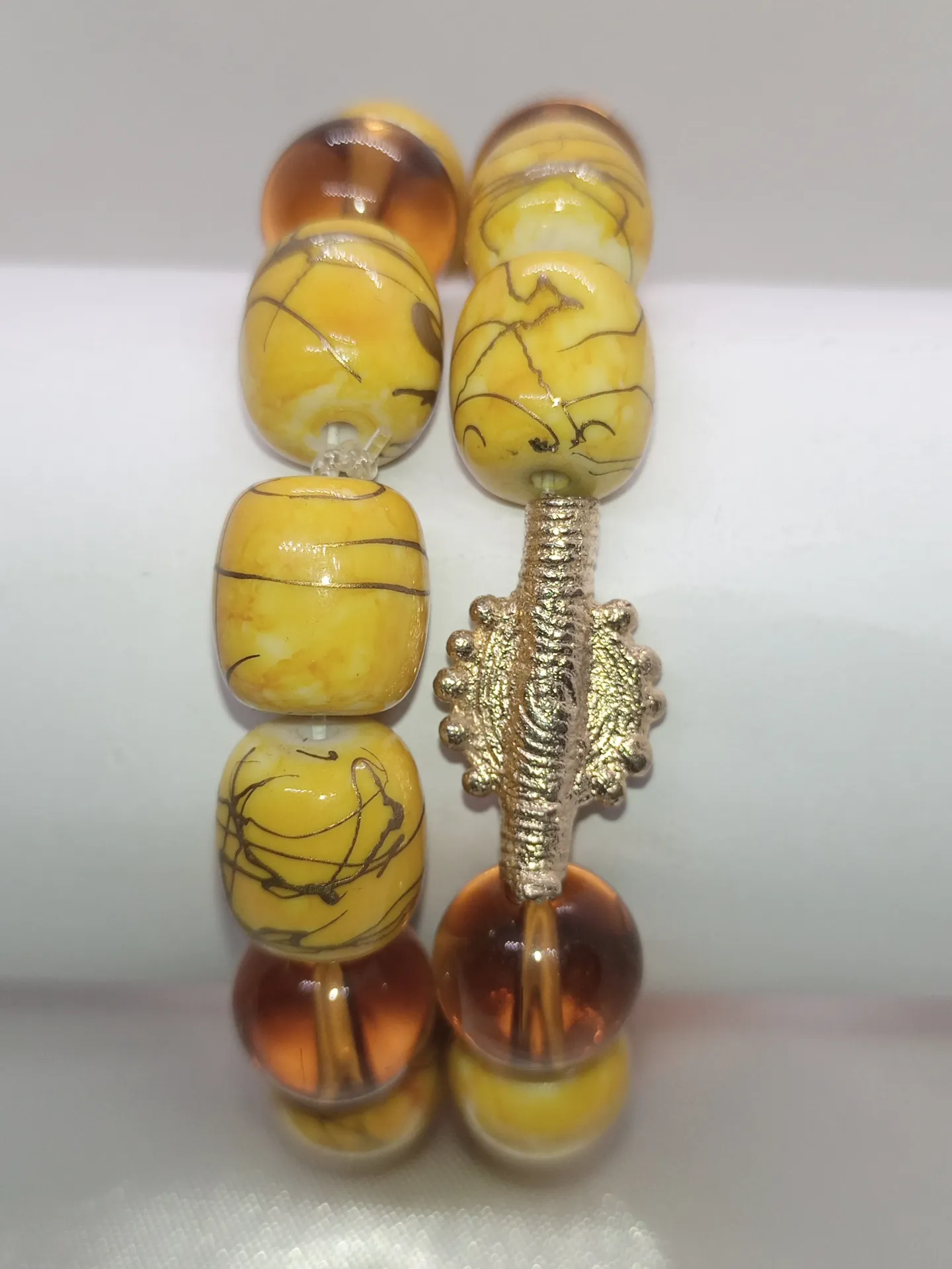 [BRAPERNADYAM2COLJAUORA] Bracelet de perles - Jaune/orange
