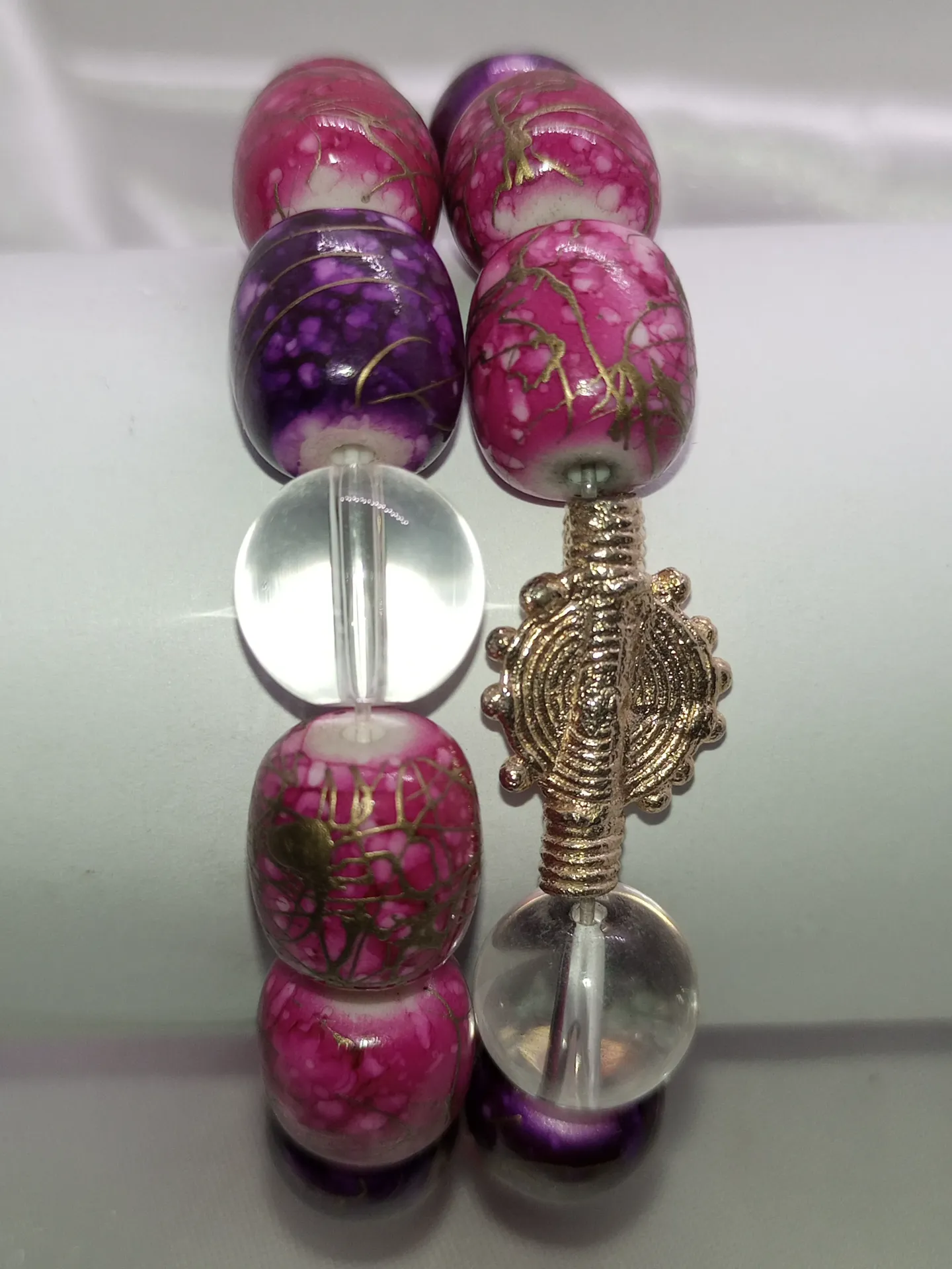 [BRAPERNADYAM3COLVIOROSTRA] Bracelet de perles rose/violet
