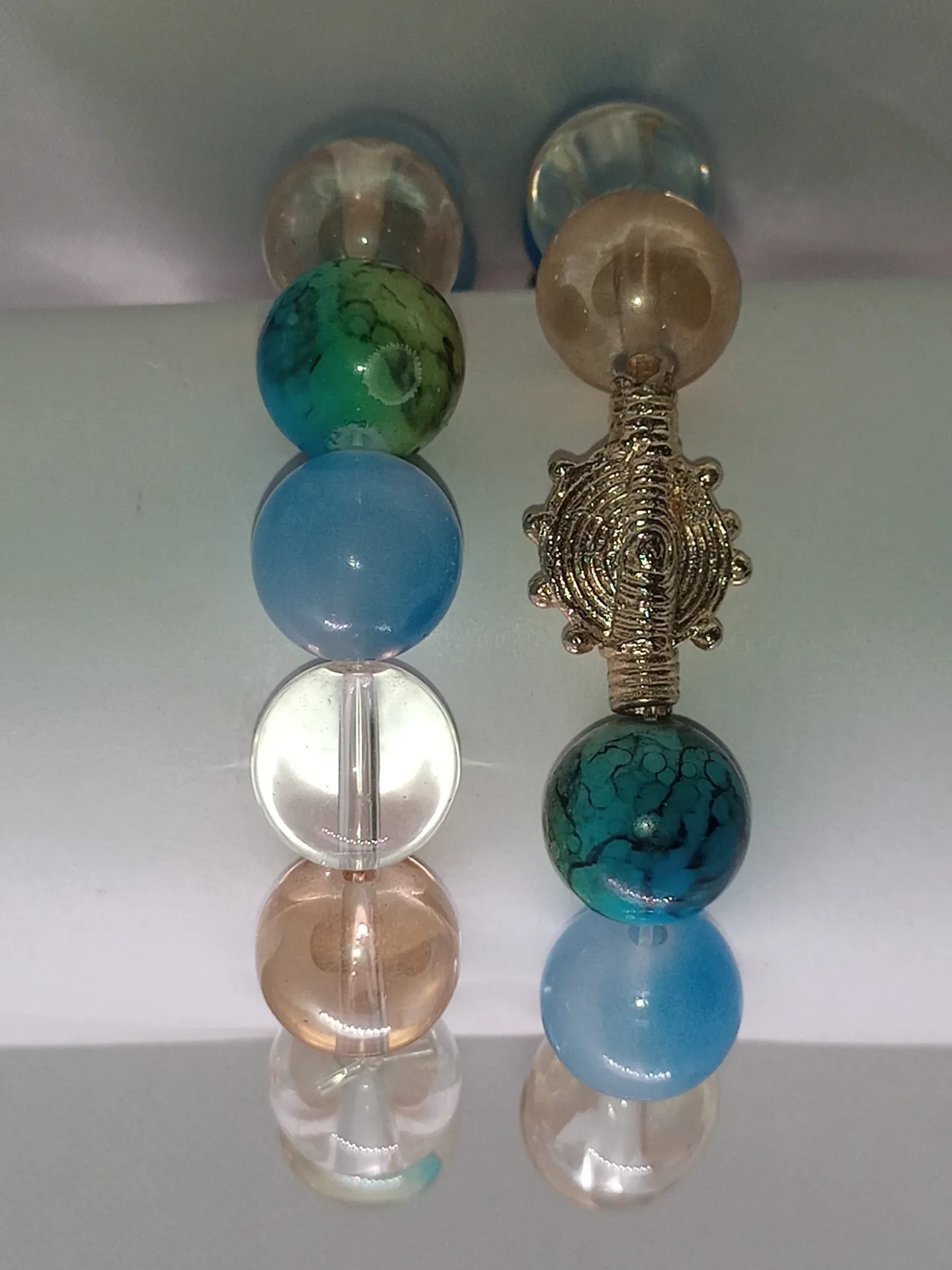 [BRAPERNADYAMMULCOLBLEUMARCLATRA] Bracelets de perles bleu/marron clair